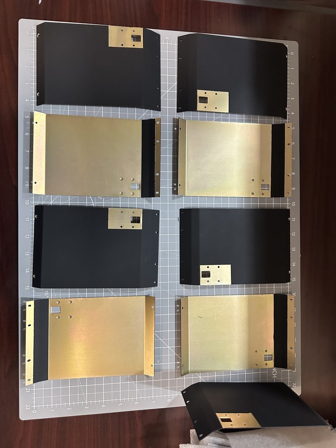 Formed chassis shroud panels with precision finish on laser grid